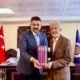 AKK Başkanı Halil İbrahim Yılmaz Prof. Dr. Mustafa Tuna'yı ziyaret etti
